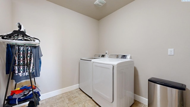 5802 Sidon Ln, Pasco, WA 99301 - laundry room featuring washer and dryer and baseboards