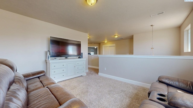 5802 Sidon Ln, Pasco, WA 99301 - living area with light colored carpet and baseboards