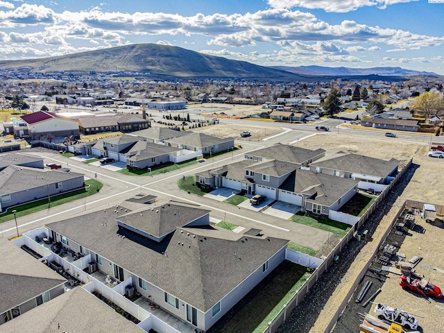 bird's eye view featuring a residential view and a mountain view