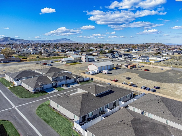 bird's eye view featuring a residential view and a mountain view