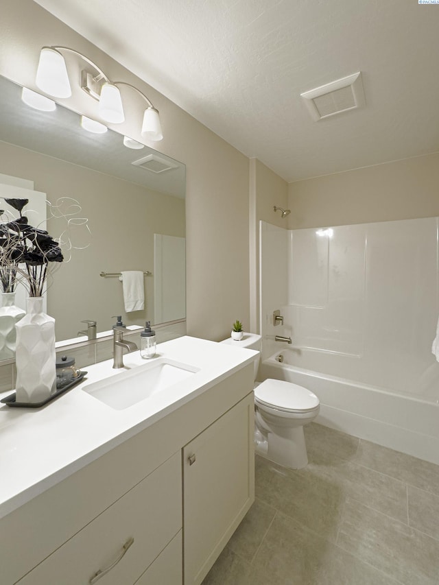 full bathroom featuring visible vents, vanity, bathtub / shower combination, and toilet