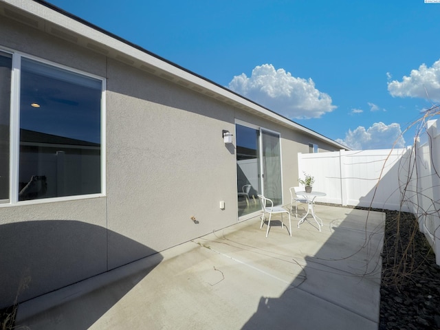 view of patio / terrace with fence