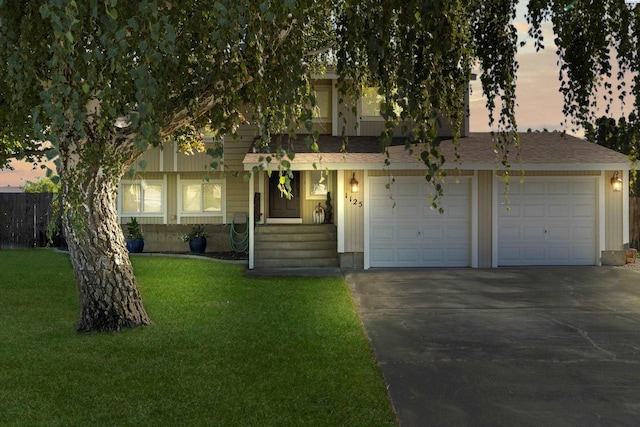 view of front facade with a yard