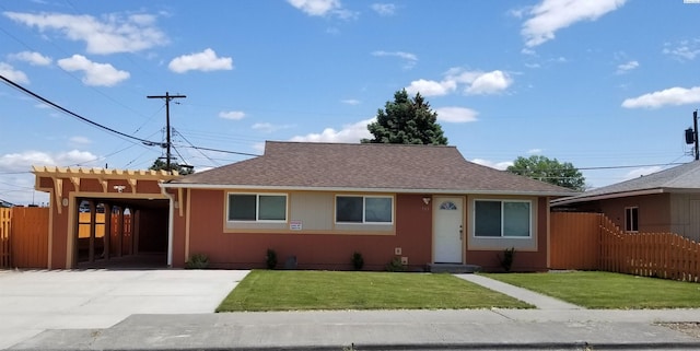 bungalow-style house featuring a carport and a front lawn