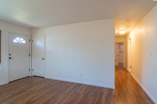 entrance foyer with dark hardwood / wood-style flooring