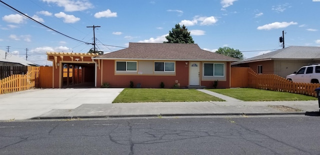 view of front of house featuring a front yard and a carport