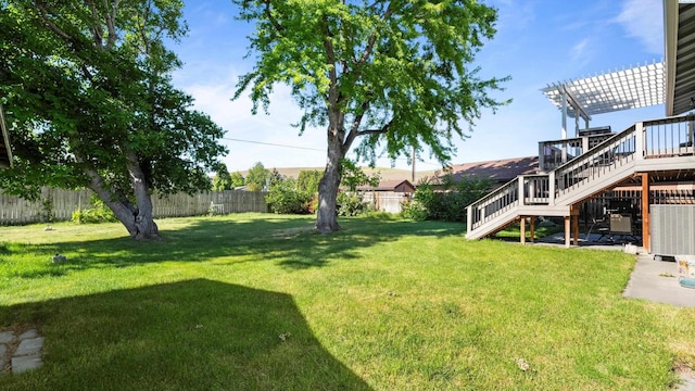 805 W 44th Pl, Kennewick, WA 99337 - view of yard with stairs, a pergola, and a wooden deck