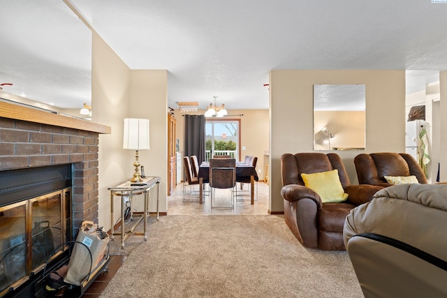 carpeted living area featuring a notable chandelier and a fireplace