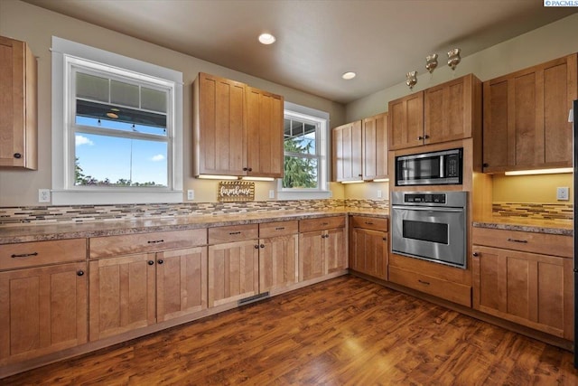168715 W Johnson Rd, Prosser, WA 99350 - kitchen featuring stainless steel appliances, dark wood-style floors, and recessed lighting