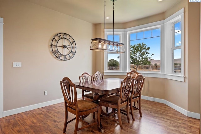 168715 W Johnson Rd, Prosser, WA 99350 - dining space featuring baseboards and wood finished floors