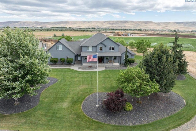 168715 W Johnson Rd, Prosser, WA 99350 - back of house with a mountain view and a yard
