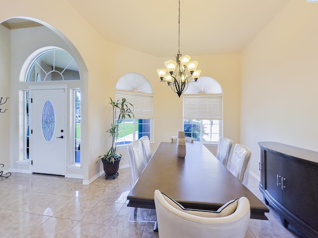 4807 Adobe Dr, Pasco, WA 99301 - dining room with a chandelier, arched walkways, and baseboards