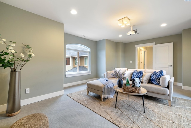 living room with light colored carpet