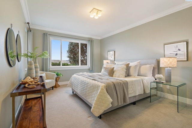 bedroom with ornamental molding and carpet floors