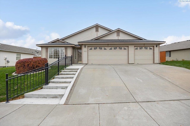 single story home with a garage and a front yard