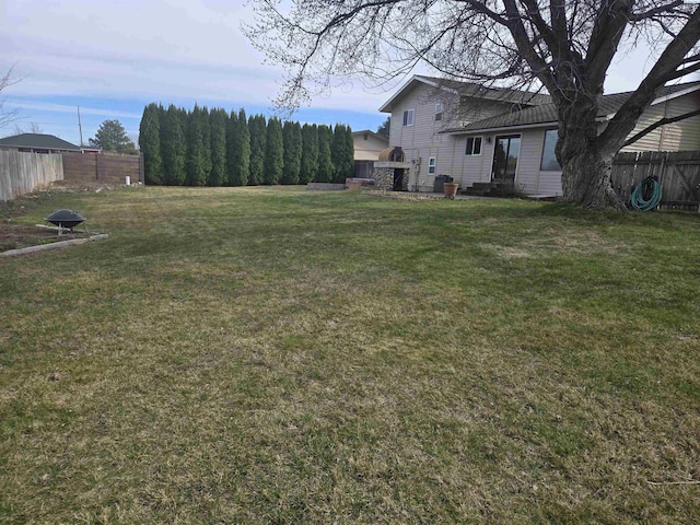 view of yard featuring fence