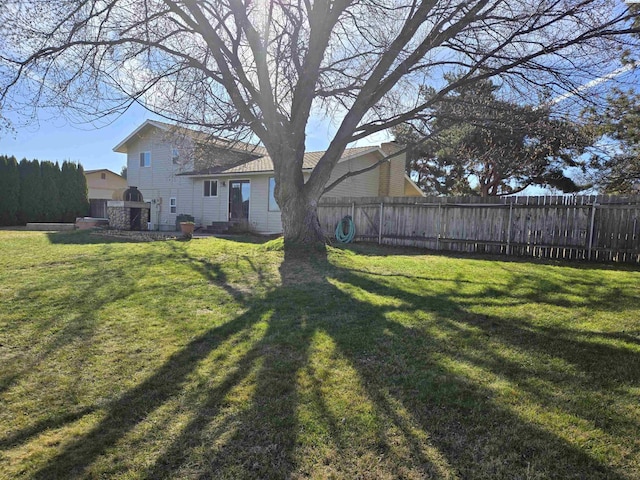 view of yard featuring fence