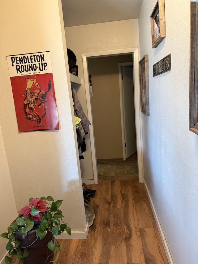 15440 W Johnson Rd, Prosser, WA 99350 - hall featuring wood finished floors and baseboards
