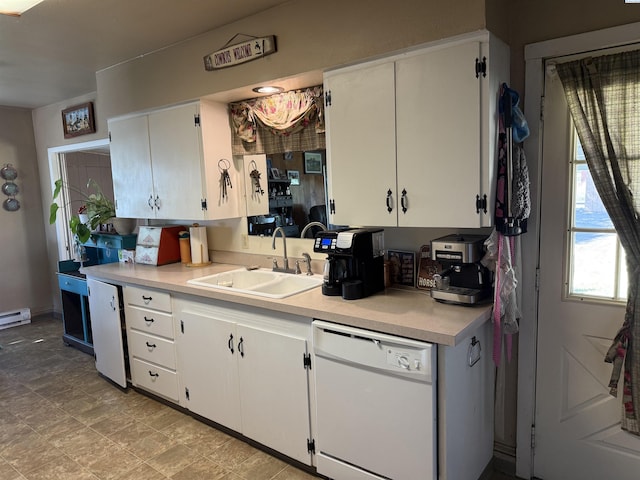 15440 W Johnson Rd, Prosser, WA 99350 - kitchen featuring dishwasher, light countertops, and white cabinetry