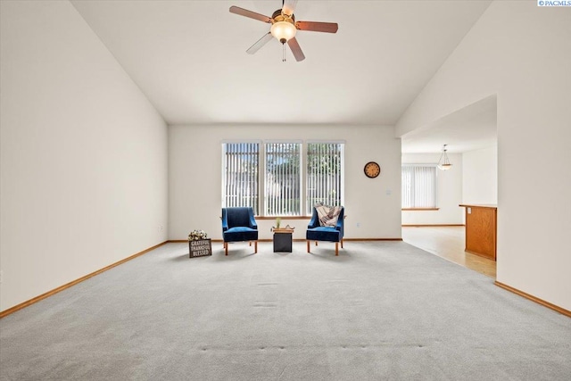 106 Muirfield Ln, Pasco, WA 99301 - sitting room with light colored carpet, ceiling fan, and lofted ceiling