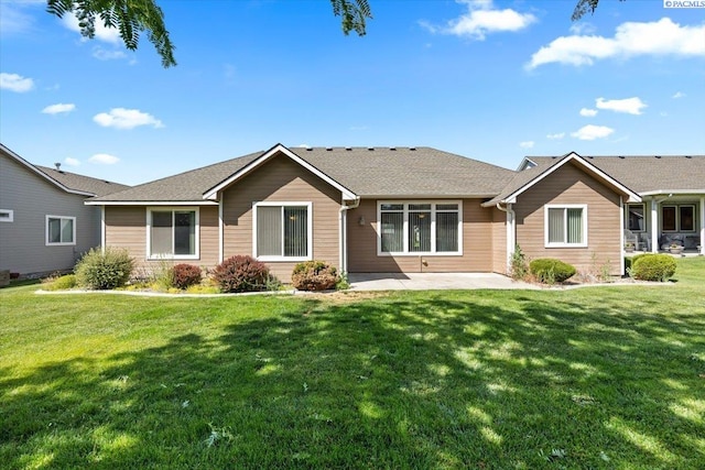 106 Muirfield Ln, Pasco, WA 99301 - single story home with a patio area and a front yard