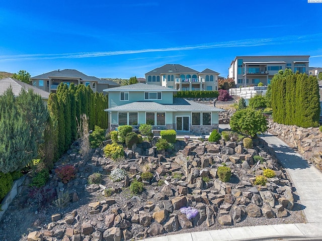 view of front of home with a residential view