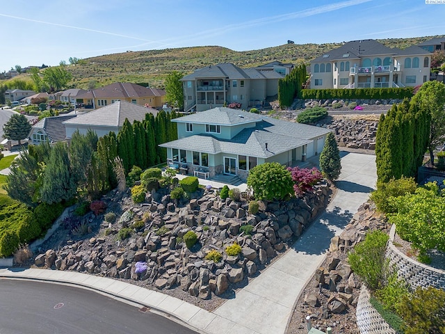 aerial view featuring a residential view and a mountain view