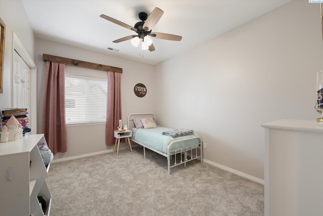 5 Hollyhock Ct, Pasco, WA 99301 - bedroom with light colored carpet, baseboards, and ceiling fan