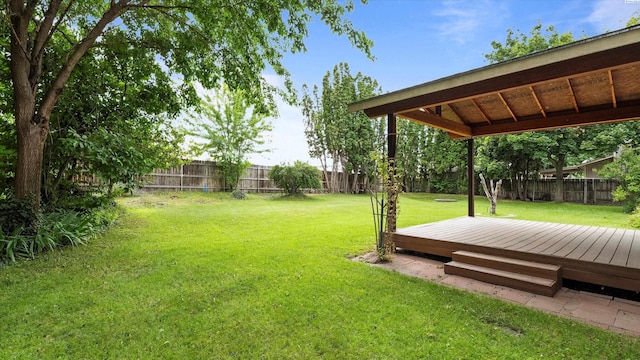 5456 Fern Loop, West Richland, WA 99352 - fenced backyard featuring a deck