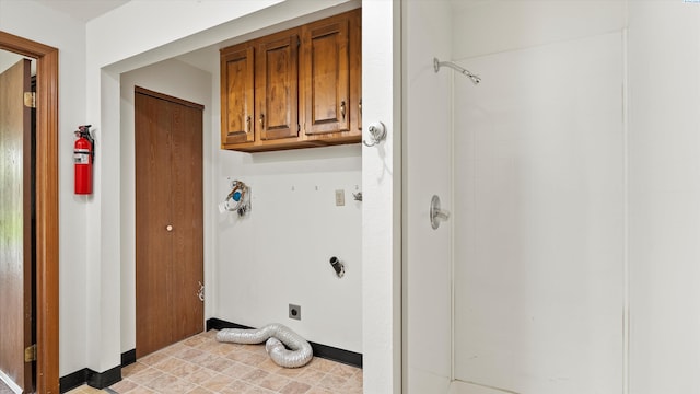 5456 Fern Loop, West Richland, WA 99352 - laundry area featuring cabinet space and hookup for an electric dryer