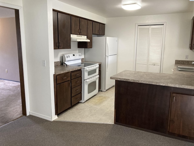 kitchen featuring light colored carpet, a sink, dark brown cabinets, white appliances, and under cabinet range hood