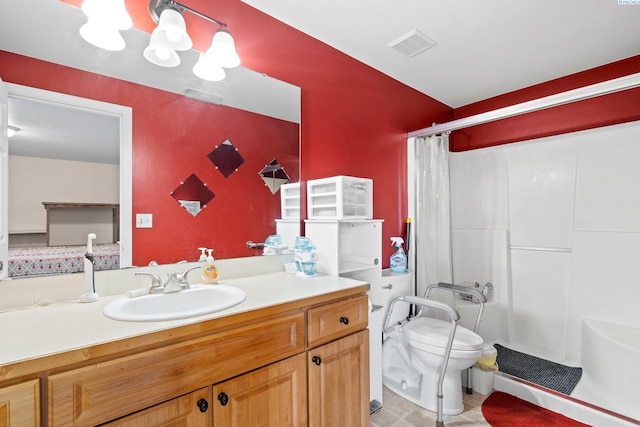 bathroom featuring vanity, toilet, a chandelier, and a shower with shower curtain