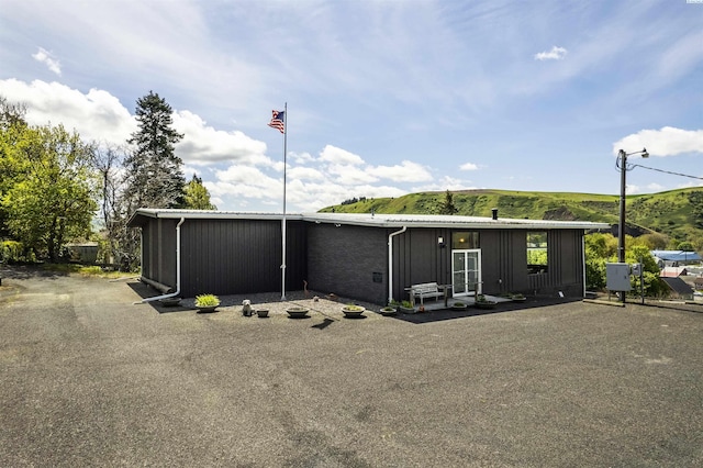 exterior space featuring a mountain view