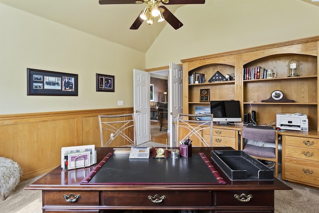 carpeted home office with vaulted ceiling and ceiling fan