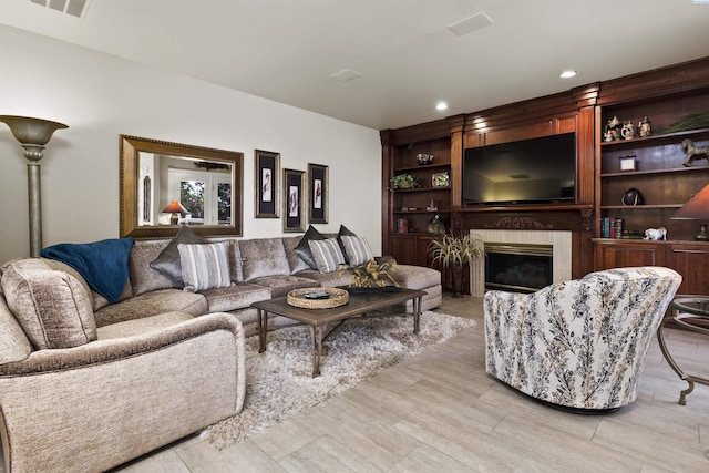 living room featuring a fireplace