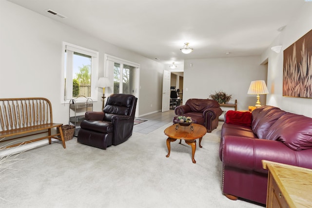 living room featuring light colored carpet