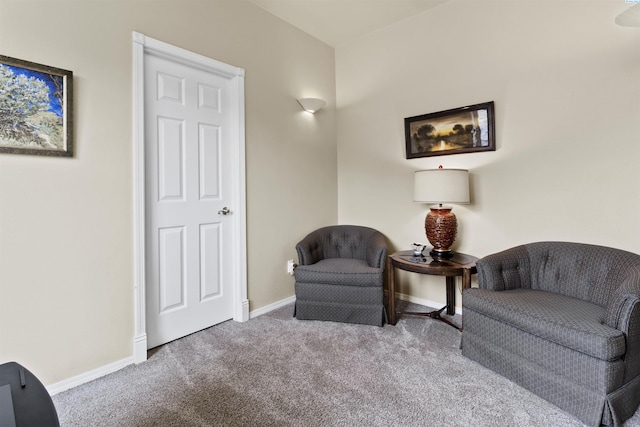 sitting room featuring carpet floors