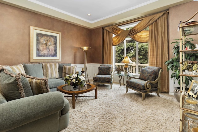 sitting room with crown molding and carpet flooring