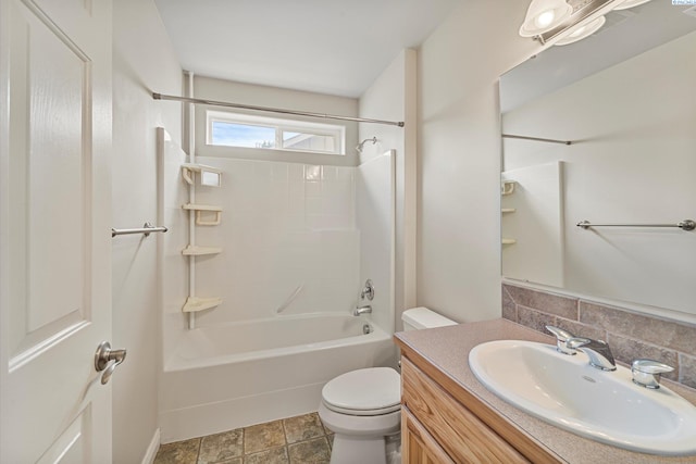 bathroom with toilet, shower / bath combination, vanity, and tasteful backsplash