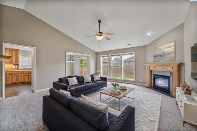 carpeted living room with a ceiling fan, baseboards, a tiled fireplace, high vaulted ceiling, and recessed lighting