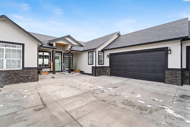 view of front of property featuring a garage