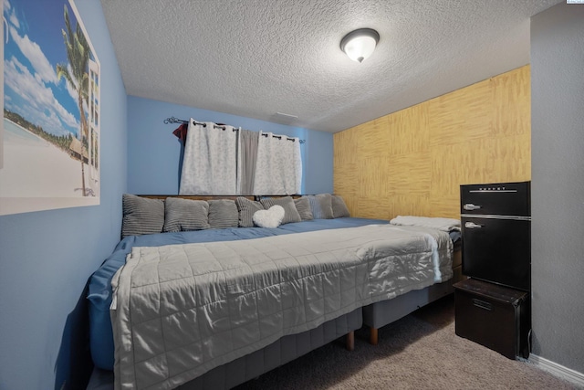 6115 Wildcat Ln, Pasco, WA 99301 - bedroom with carpet flooring and a textured ceiling