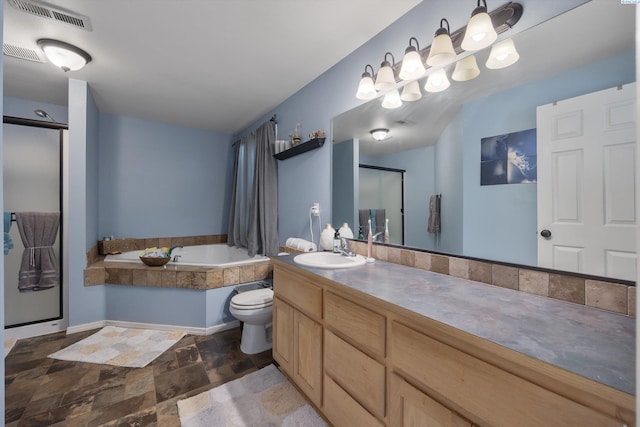 6115 Wildcat Ln, Pasco, WA 99301 - bathroom featuring stone finish floor, visible vents, vanity, a bath, and a stall shower
