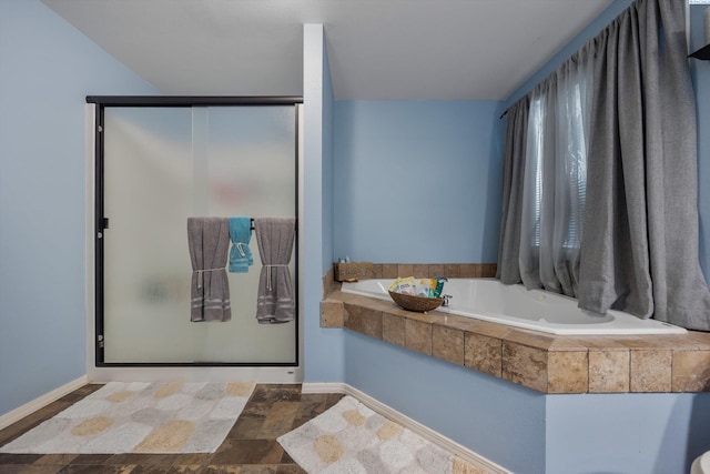 6115 Wildcat Ln, Pasco, WA 99301 - full bath with a shower stall, stone finish flooring, baseboards, and a garden tub