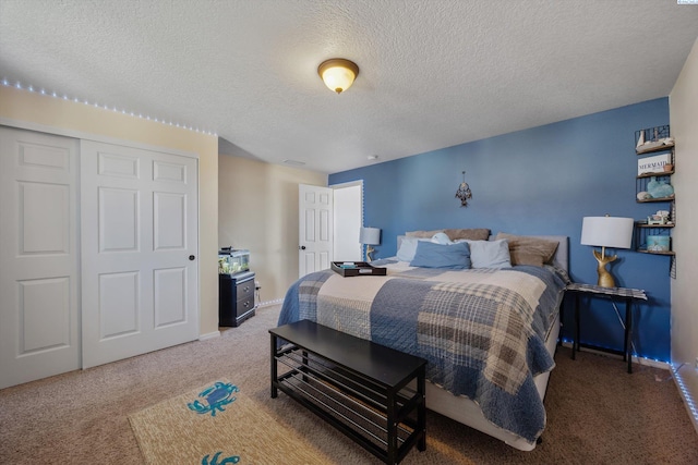 6115 Wildcat Ln, Pasco, WA 99301 - carpeted bedroom featuring baseboards, a textured ceiling, and a closet