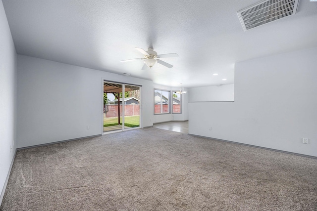 8307 Camano Dr, Pasco, WA 99301 - carpeted spare room with ceiling fan, a chandelier, and recessed lighting