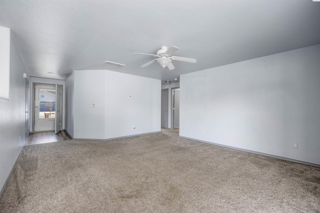 8307 Camano Dr, Pasco, WA 99301 - unfurnished room featuring light colored carpet and a ceiling fan