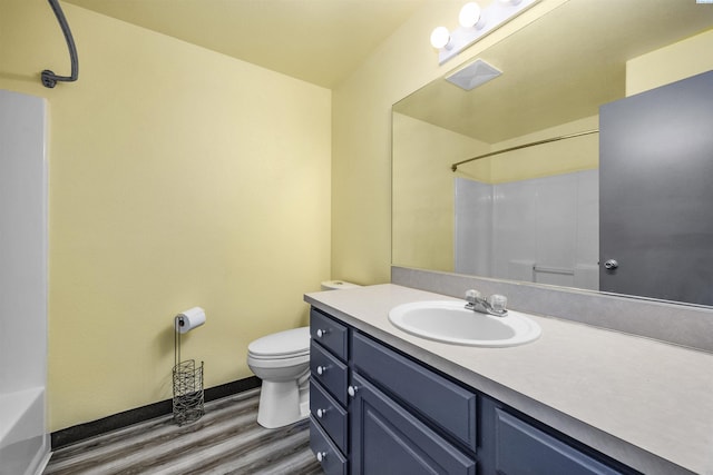 8307 Camano Dr, Pasco, WA 99301 - full bathroom featuring wood finished floors, vanity, a shower, and a bathtub