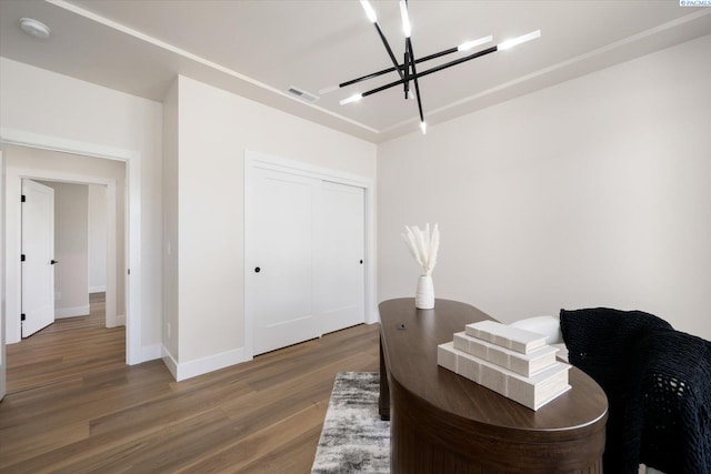 561 Lazio Way, Richland, WA 99352 - office with a chandelier, wood finished floors, and baseboards