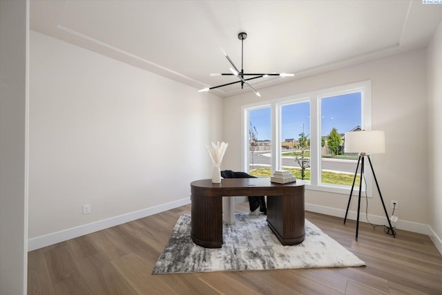 561 Lazio Way, Richland, WA 99352 - office area featuring a chandelier, baseboards, and wood finished floors